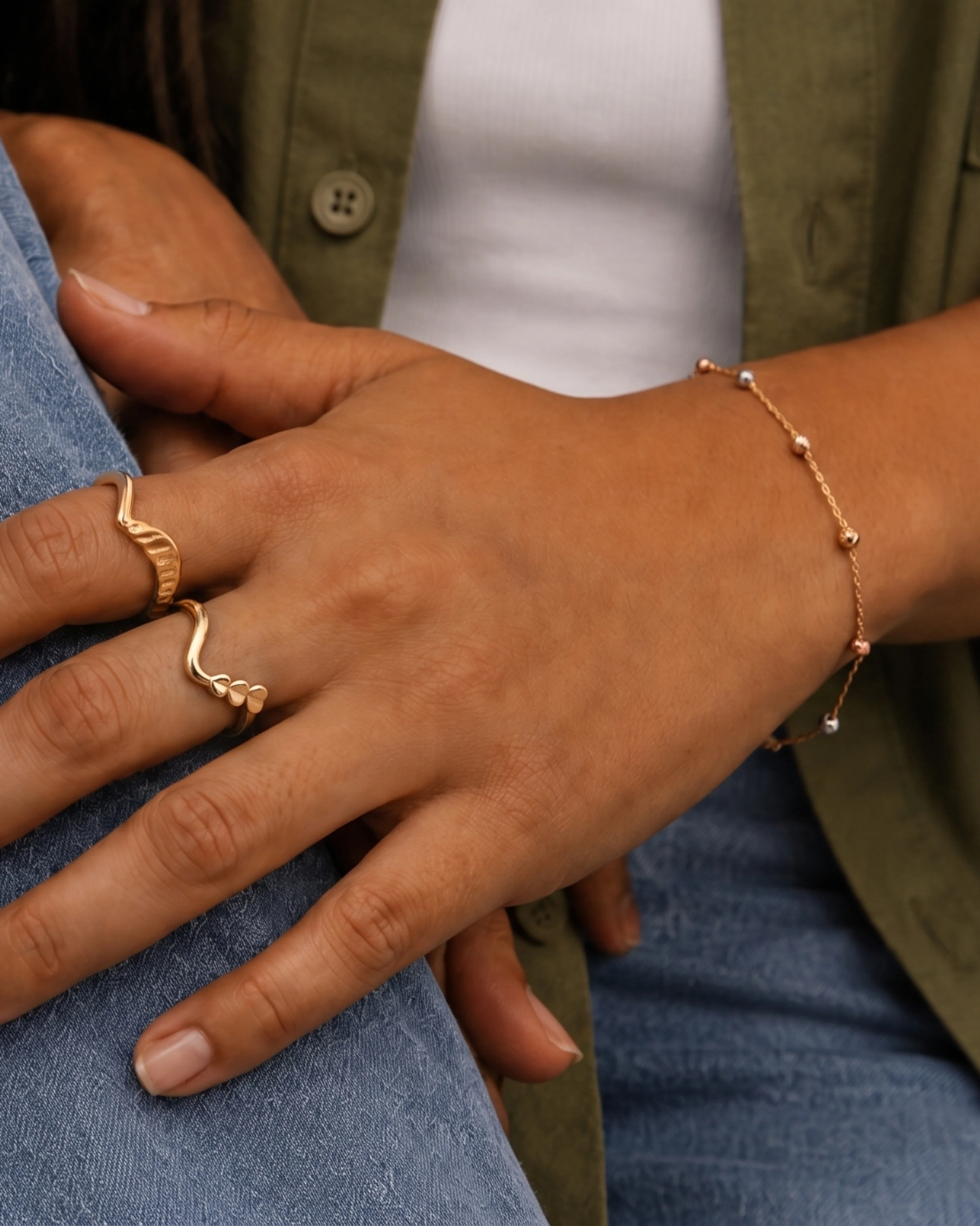 Hand with gold rings